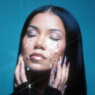 Woman with eyes closed, crystal teardrops on her face against a teal background, artistic makeup look